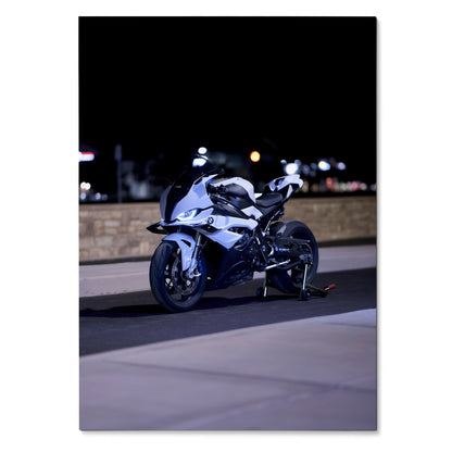 BMW S1000RR motorcycle poster with sleek white sportbike design against dark city night background wall art.