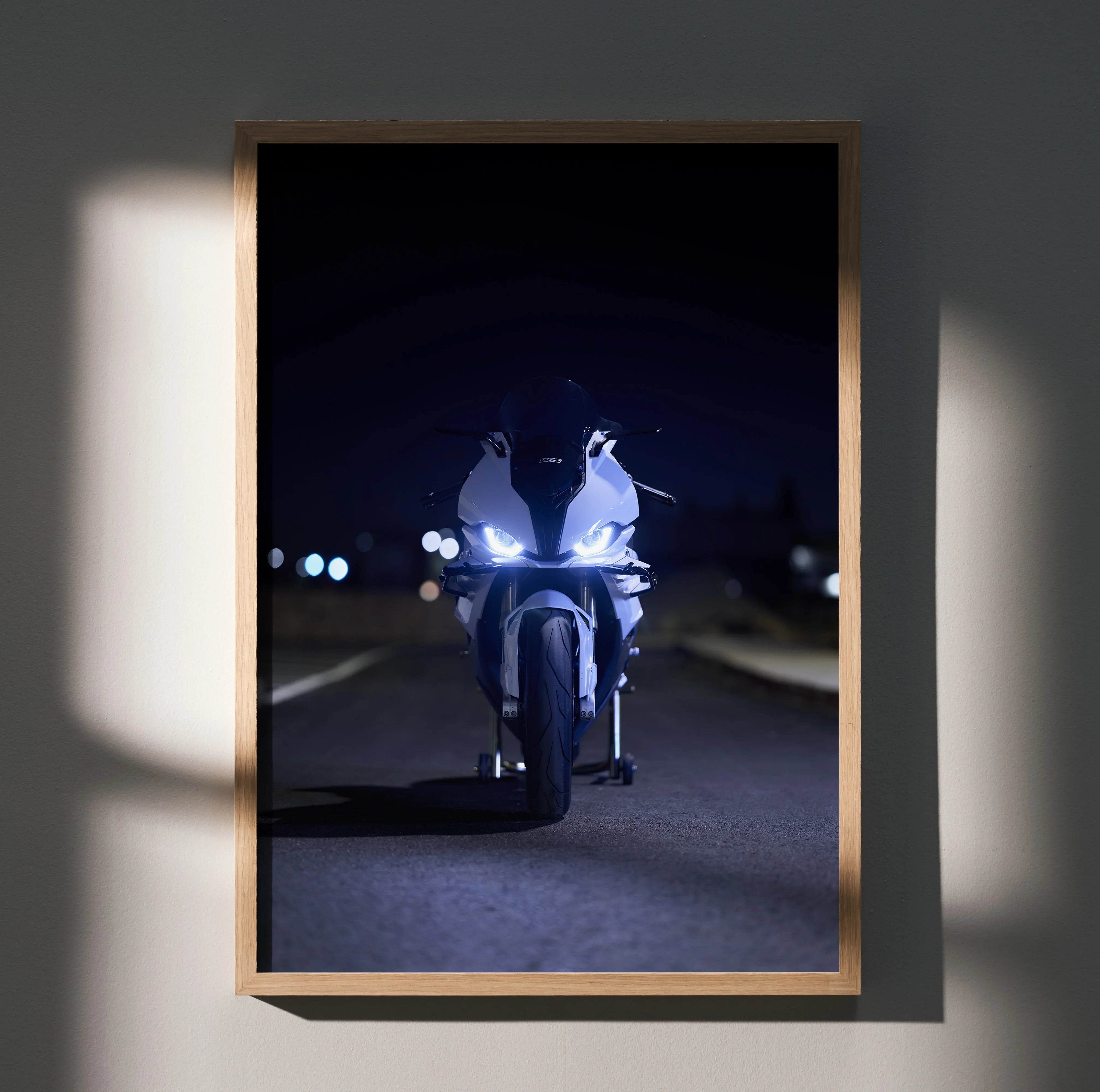 BMW S1000RR motorcycle poster wall art with nighttime road scene and bright headlights.