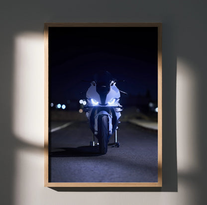 BMW S1000RR motorcycle poster wall art with nighttime road scene and bright headlights.
