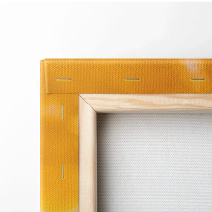 Close-up of vibrant orange canvas art print with visible wooden stretcher bars and staples on back.