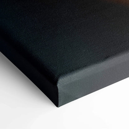 Close-up of black wrapped canvas edge with textured surface for wall art decor.