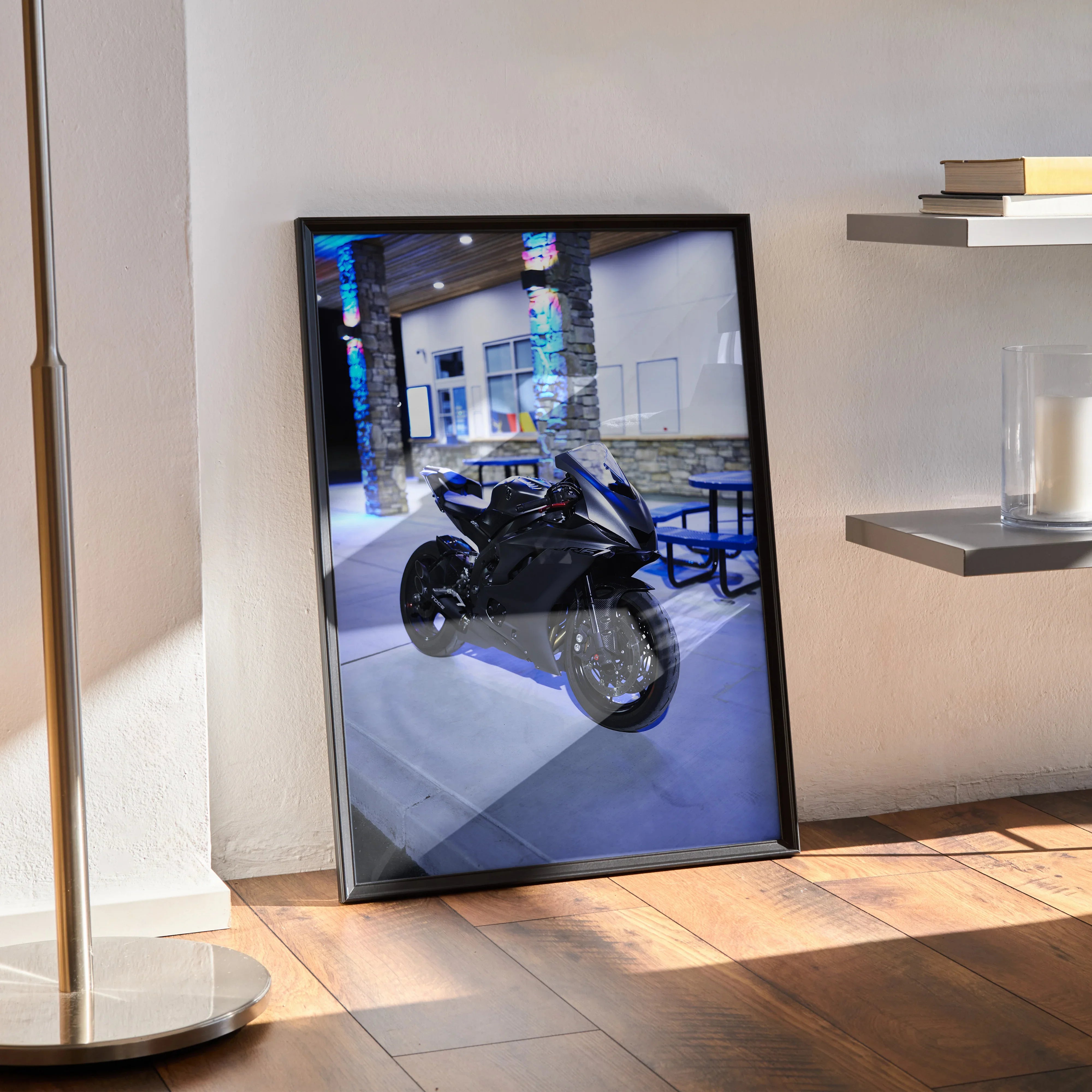 Framed Yamaha R6 motorcycle poster leaning against wall with modern interior lighting, wall art print.
