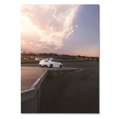 Mitsubishi Evo 10 white car parked on empty road under dramatic sunset sky poster wall art.