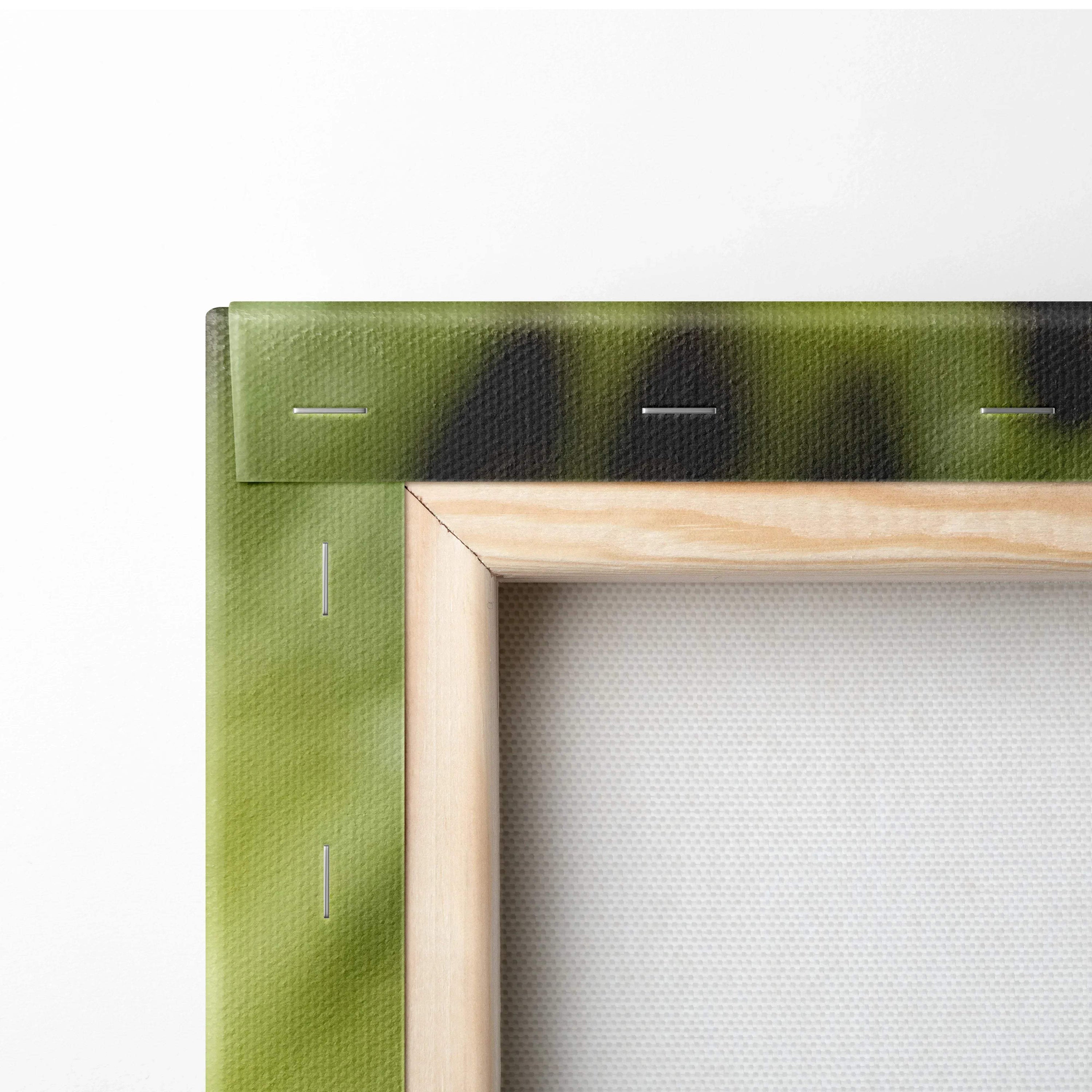 Close-up of wooden frame with green-stretched canvas backing for wall art decor.