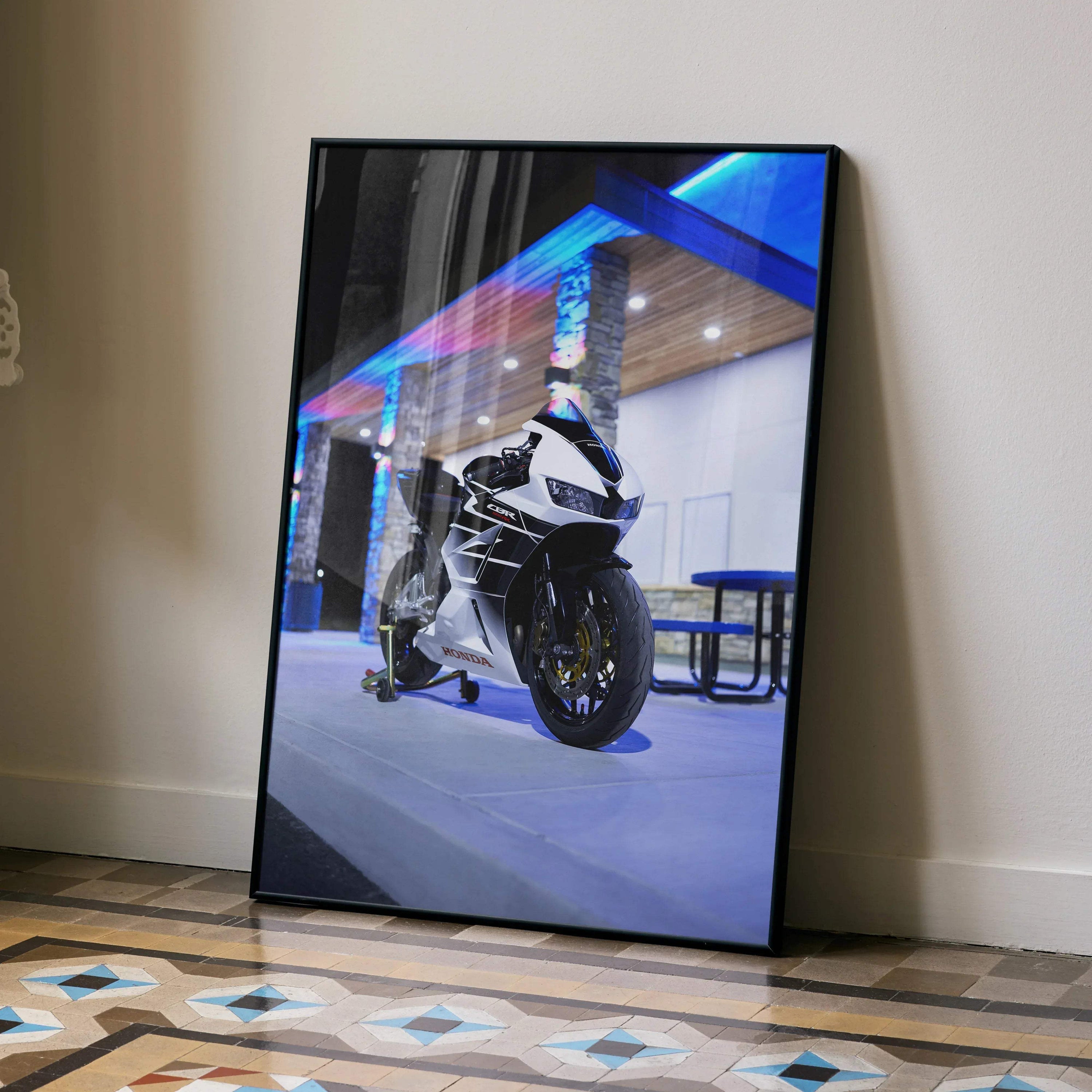 Honda CBR600RR motorcycle poster with black frame leaning against wall, modern wall art.
