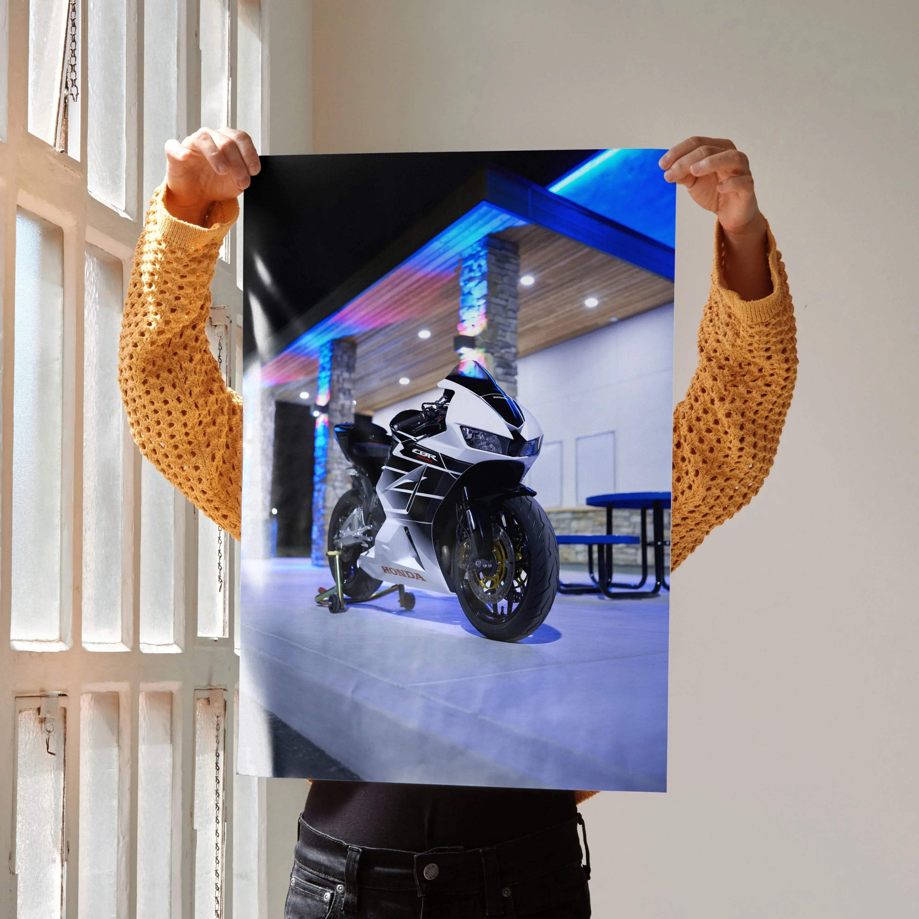 Honda CBR600RR motorcycle poster showcasing sleek white bike in vibrant urban night scene wall art.