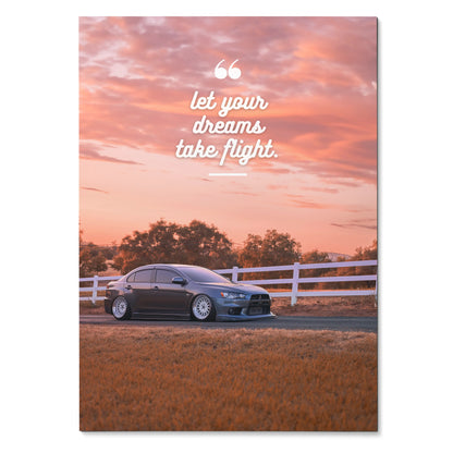 Motivational poster wall art with Mitsubishi Evo 10 under a pink sunset sky and inspiring white text.