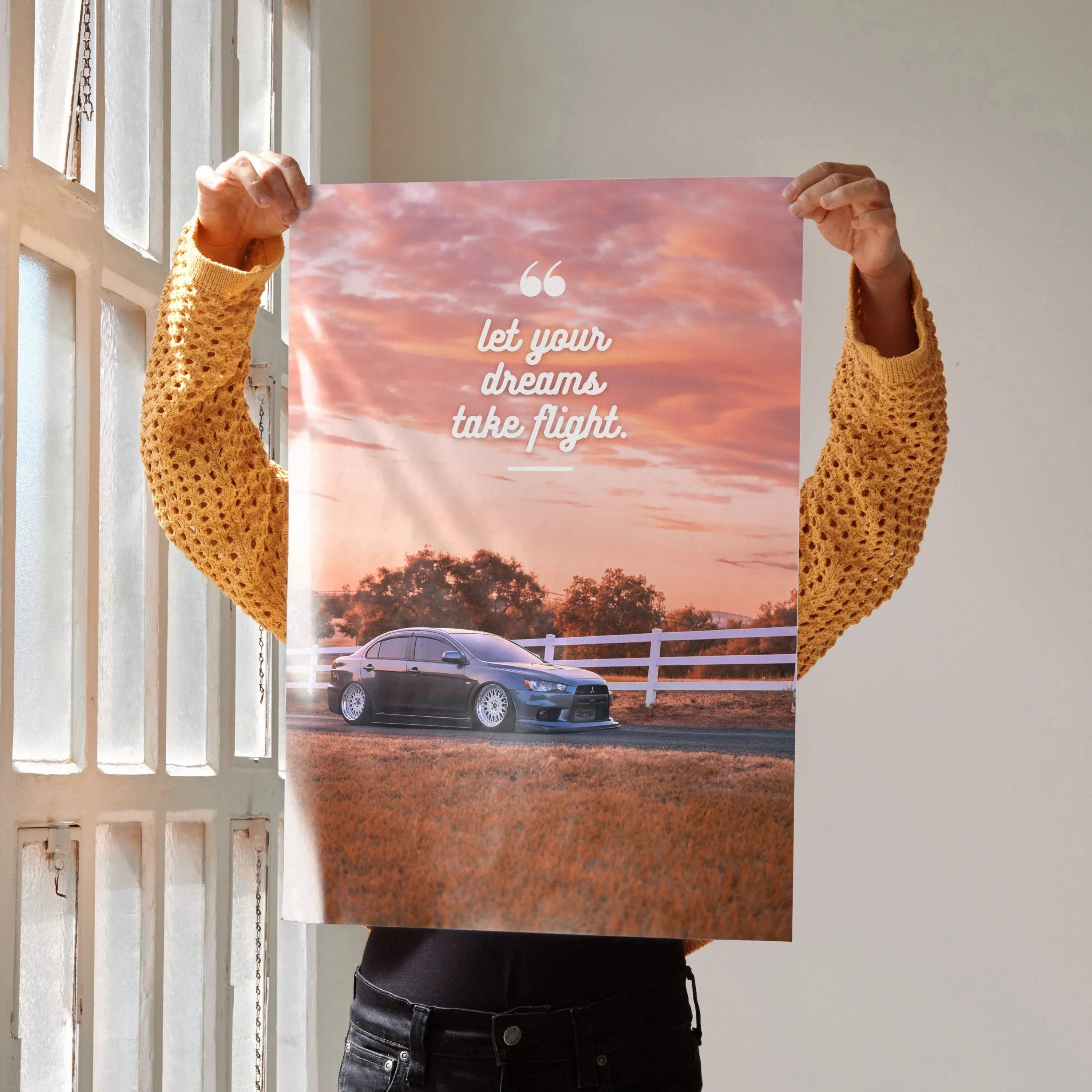 Motivational poster wall art featuring a Mitsubishi Evo 10 with inspiring sunset text.