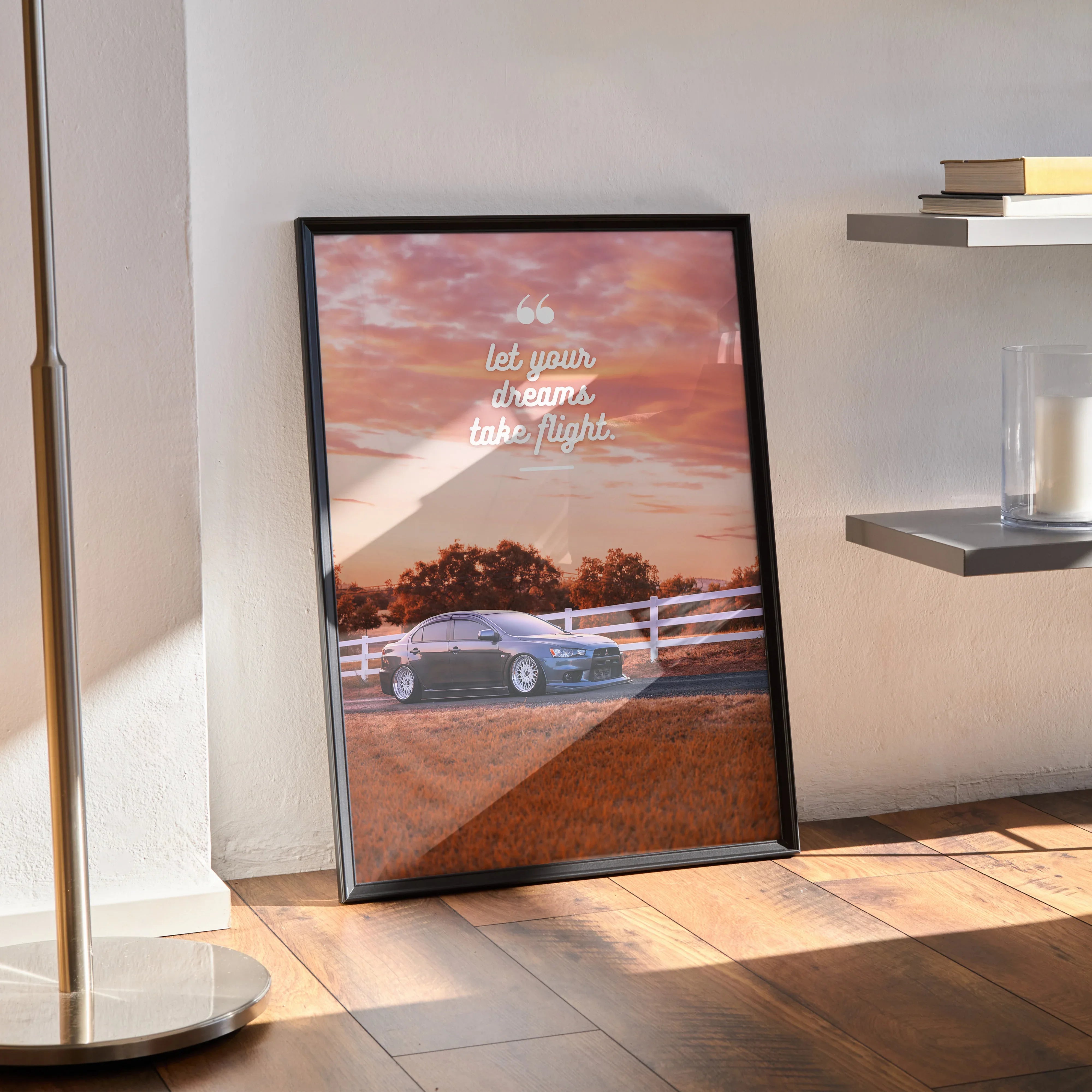 Motivational poster wall art featuring a Mitsubishi Evo 10 on a sunset road with inspiring text in white script.