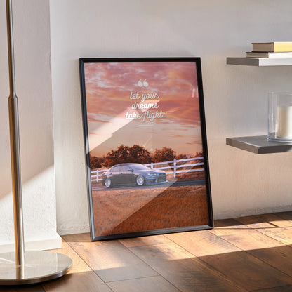 Motivational poster wall art featuring a Mitsubishi Evo 10 on a sunset road with inspiring text in white script.