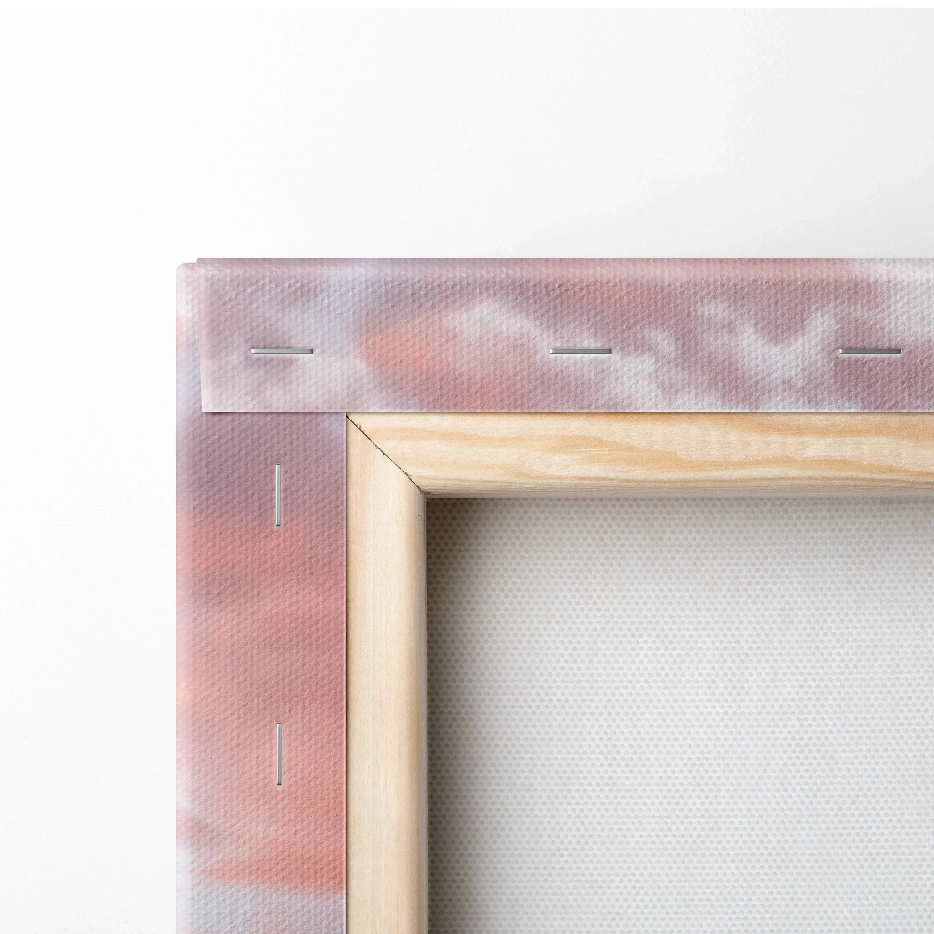 Close-up of wooden stretcher frame and stapled canvas edge for vertical wall art canvas print.