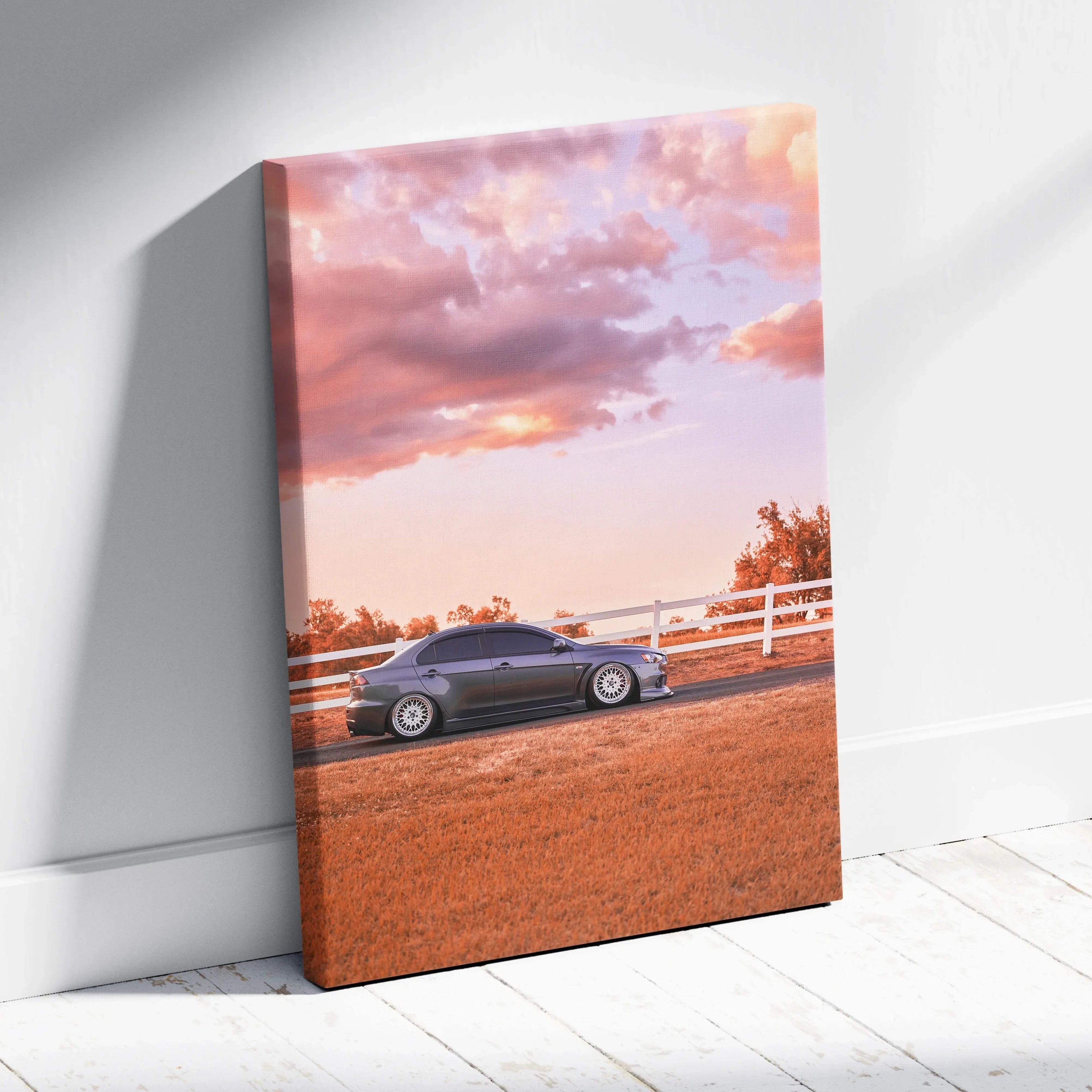 Mitsubishi Evo 10 parked at sunset with pink sky on vertical canvas wall art.