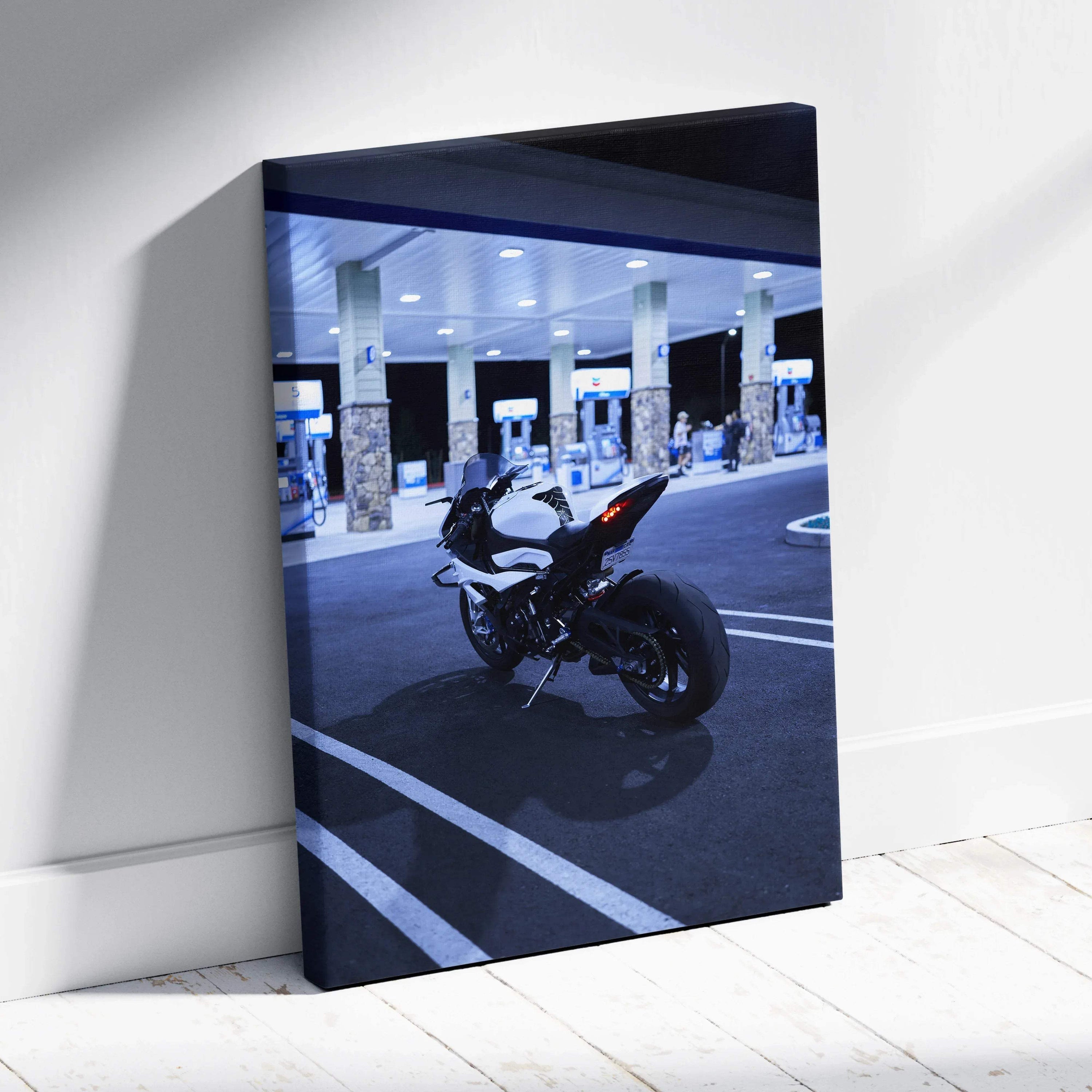 BMW S1000RR motorcycle parked at a gas station at night on vertical canvas wall art.