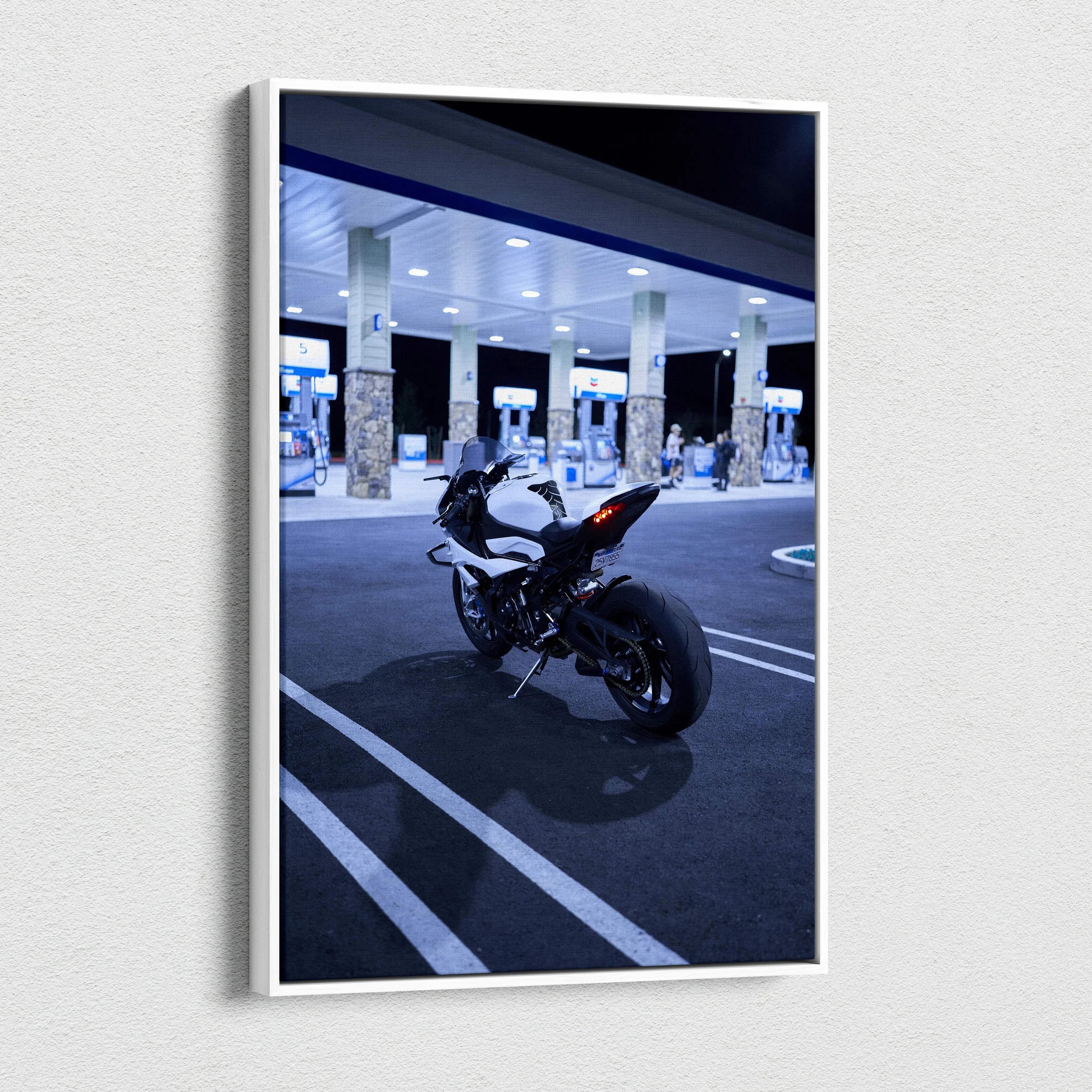 Vertical canvas art of a BMW S1000RR motorcycle at a gas station at night, modern wall art.