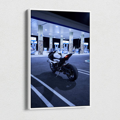 Vertical canvas art of a BMW S1000RR motorcycle at a gas station at night, modern wall art.