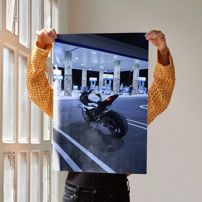 BMW S1000RR motorcycle poster showcasing sleek bike at night, perfect wall art for enthusiasts.