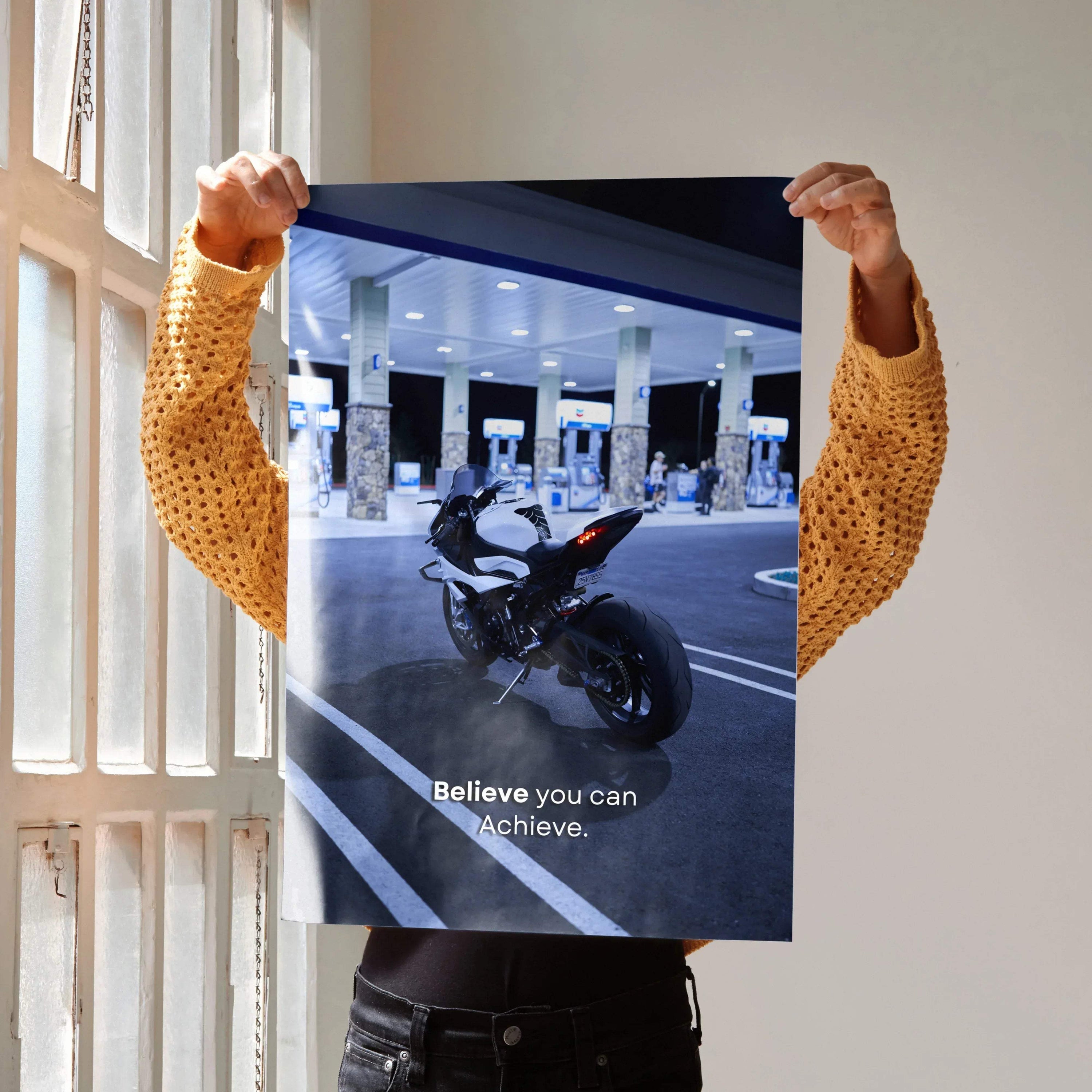 BMW S1000RR motorcycle poster with motivational text "Believe you can and you're halfway there" as wall art.