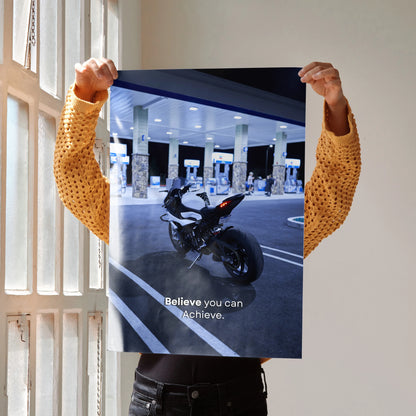 BMW S1000RR motorcycle poster with motivational text "Believe you can and you're halfway there" as wall art.
