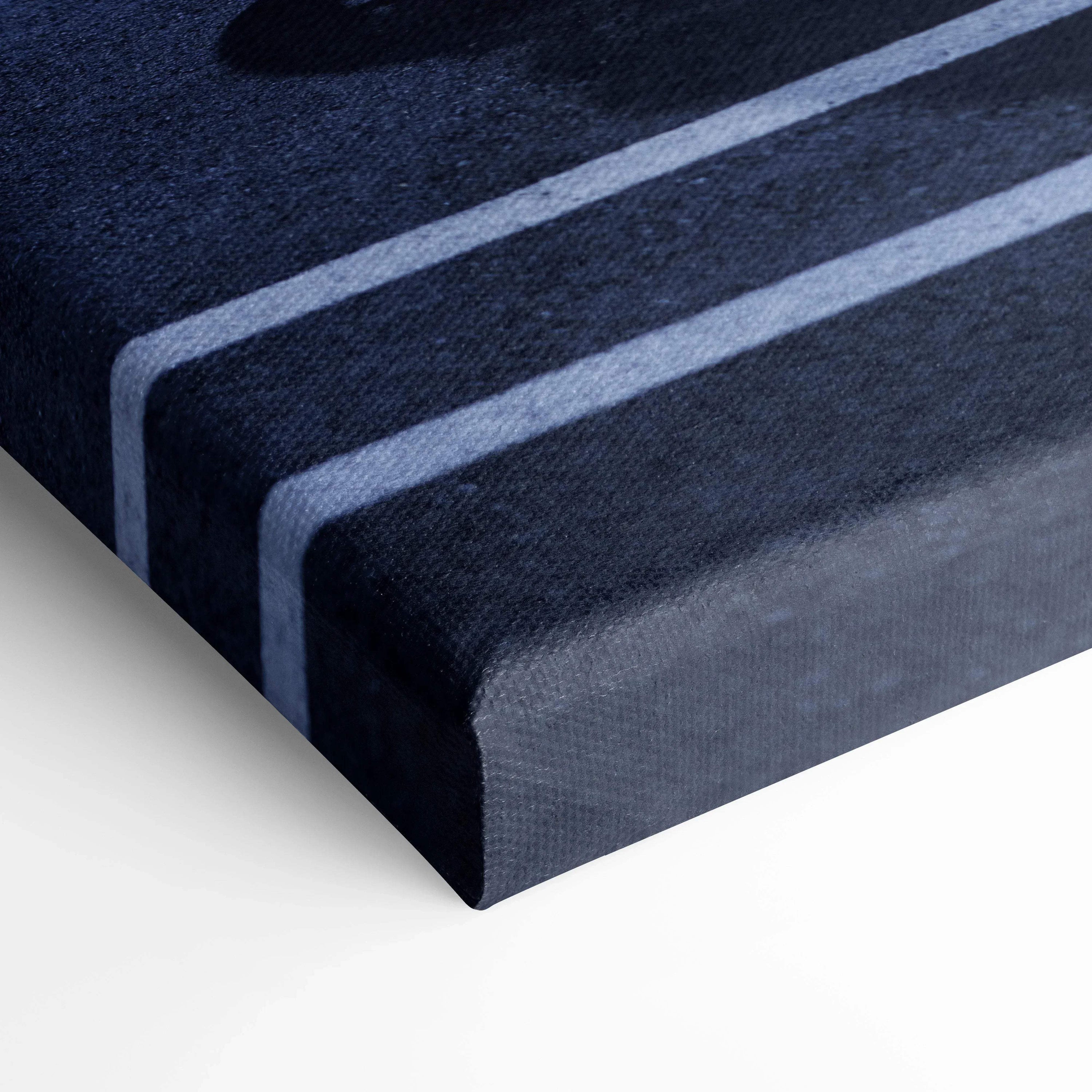 Close-up of black and dark blue vertical canvas wall art with two parallel light gray stripes, museum-quality canvas art.
