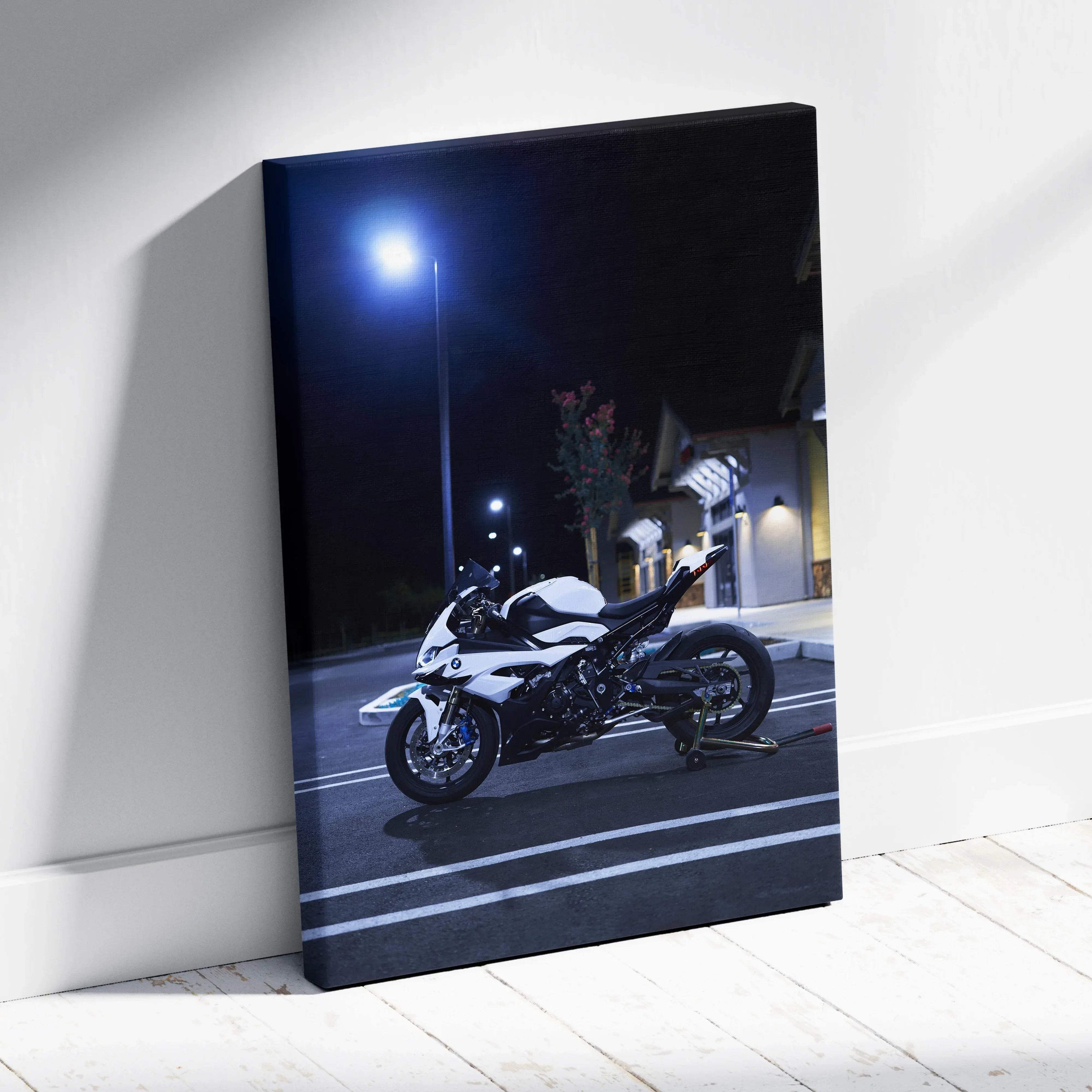 Vertical canvas wall art featuring a BMW S1000RR motorcycle at night with streetlight glow.