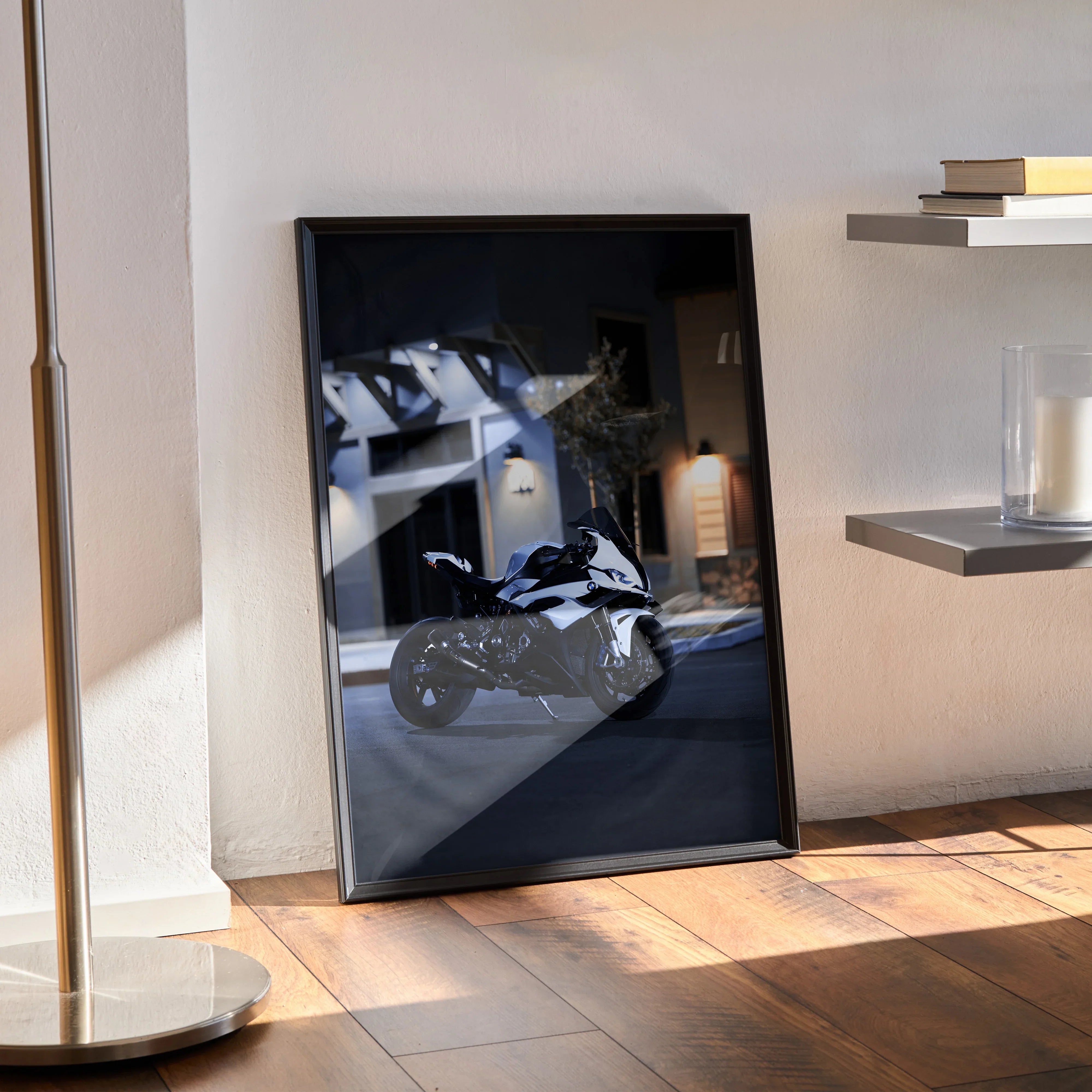 Sleek black-framed BMW S1000RR racing motorcycle poster wall art with reflective glossy finish.