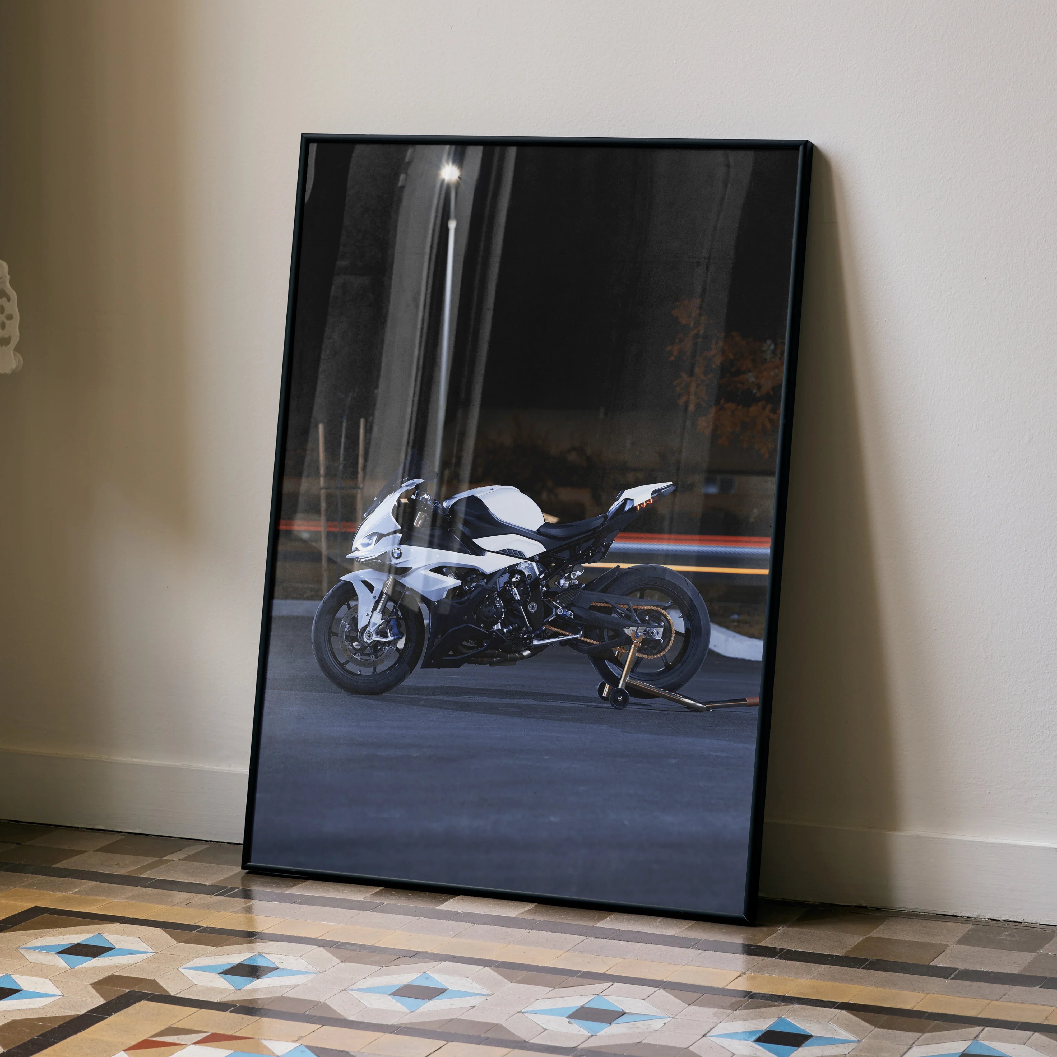 BMW inspired S1000RR motorcycle poster with sleek black and white design leaning against wall wall art.