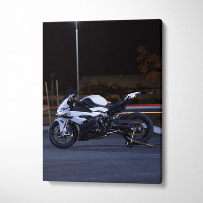 BMW S1000RR motorcycle on road at night canvas wall art with dark background.