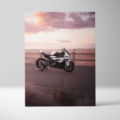 BMW S1000RR motorcycle canvas wall art with sunset background and sandy foreground.