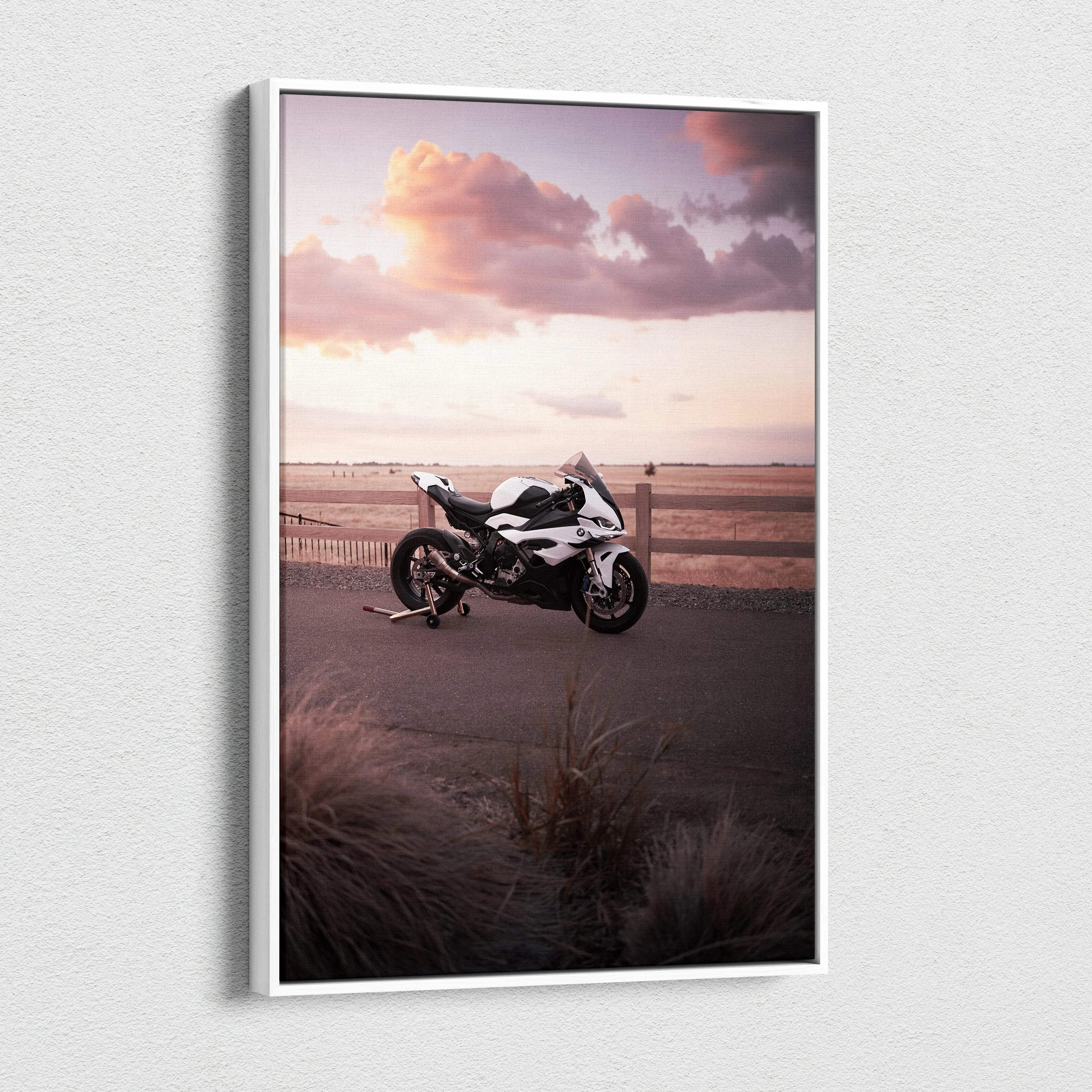 BMW S1000RR motorcycle canvas wall art with sunset sky and coastal landscape.