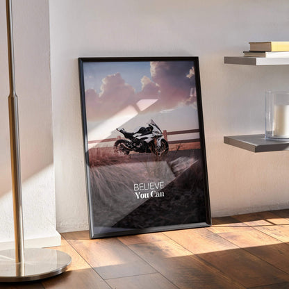 BMW S1000RR motorcycle motivational poster with "Believe You Can" text and sunset background wall art.
