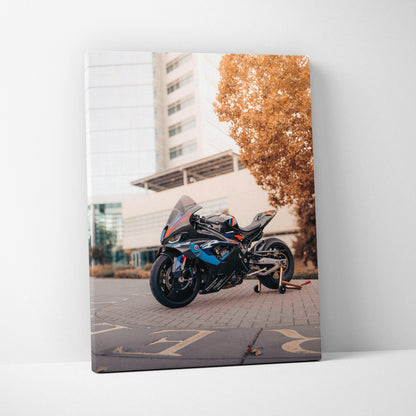 BMW M1000RR motorcycle on urban street in high-resolution vertical canvas wall art with modern city background.