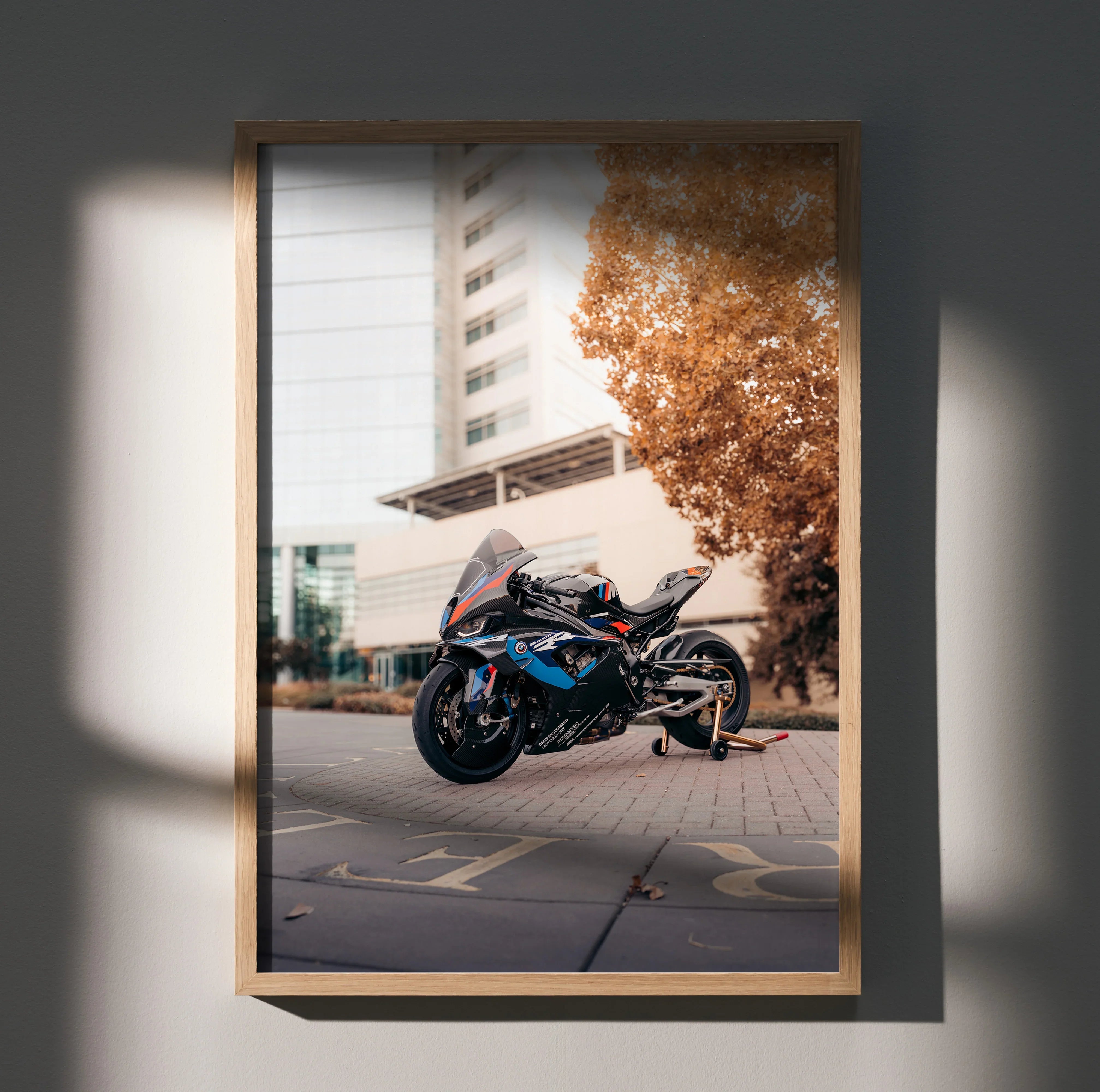 BMW M1000RR motorcycle poster with sunset and autumn tree, stylish wall art for bike lovers.