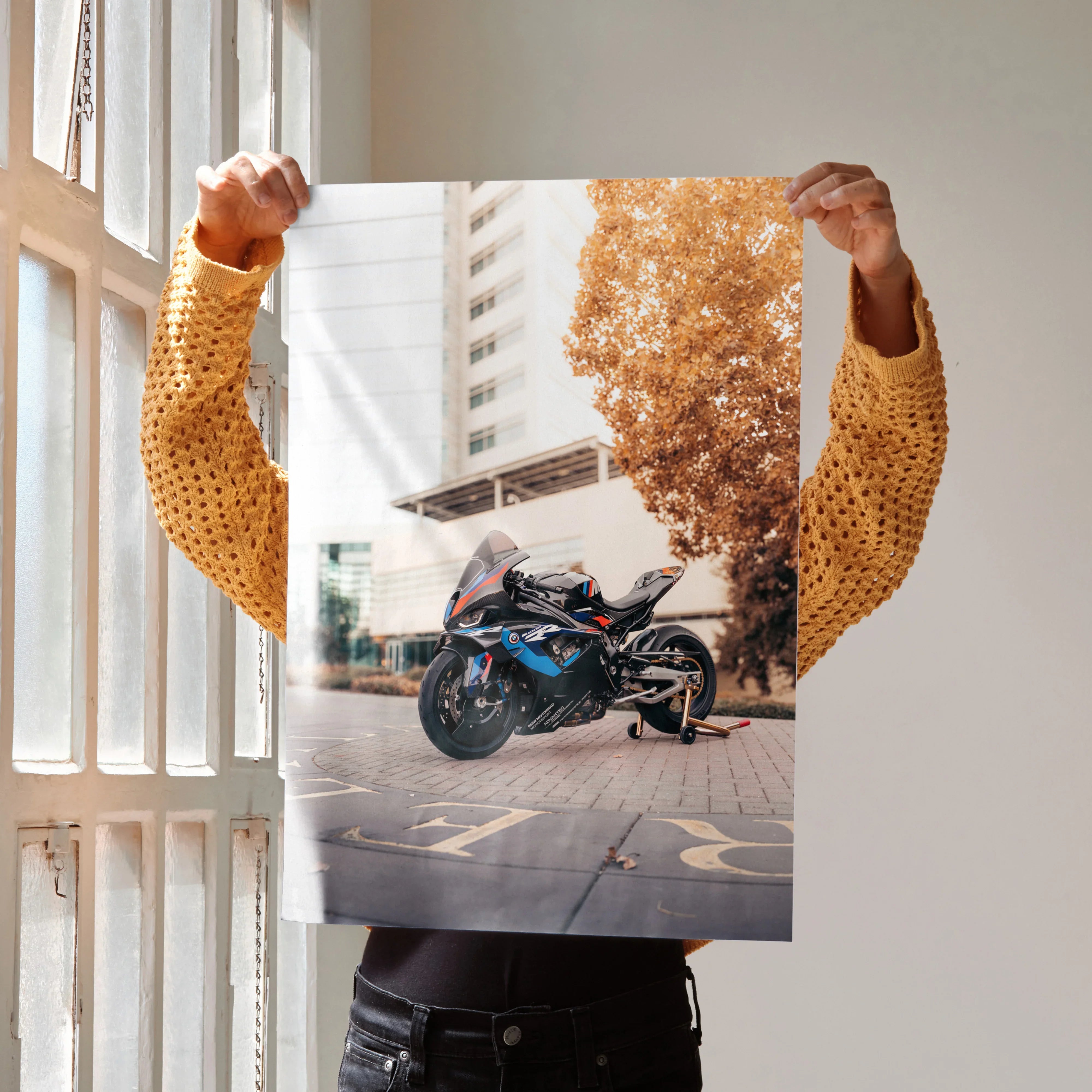 BMW M1000RR motorcycle poster with sunset backdrop, premium wall art for bike lovers.