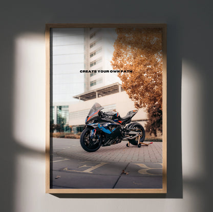 BMW M1000RR motorcycle motivational poster with "Create Your Own Path" text, wall art in wooden frame.