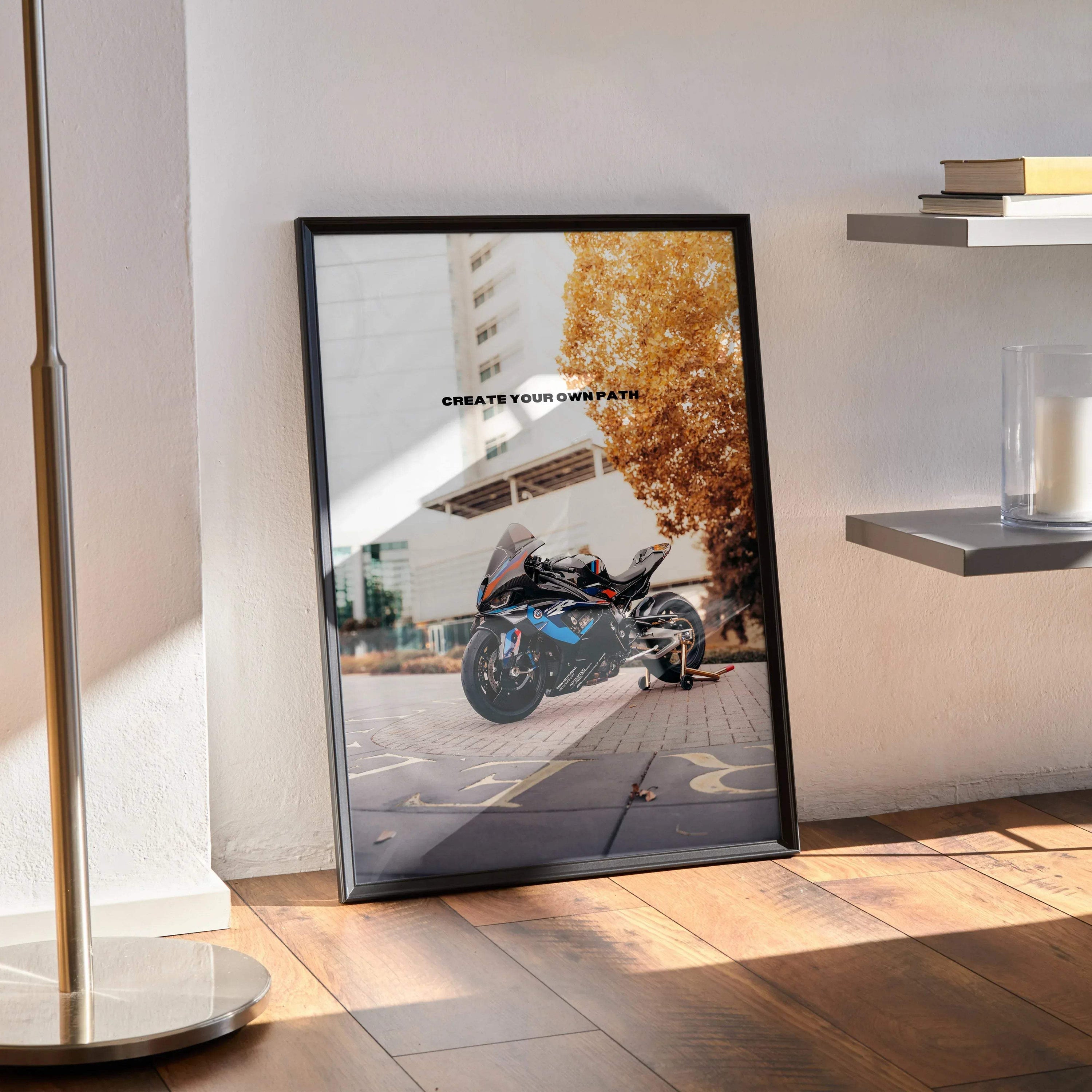 BMW M1000RR motorcycle poster with inspiring text, modern wall art in black frame.