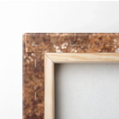 Close-up of wooden stretcher bars and stapled edges on blank canvas wall art.