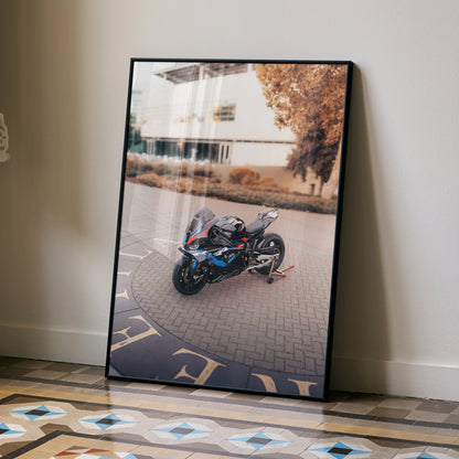 BMW M1000RR motorcycle poster with sleek black design and urban background wall art.