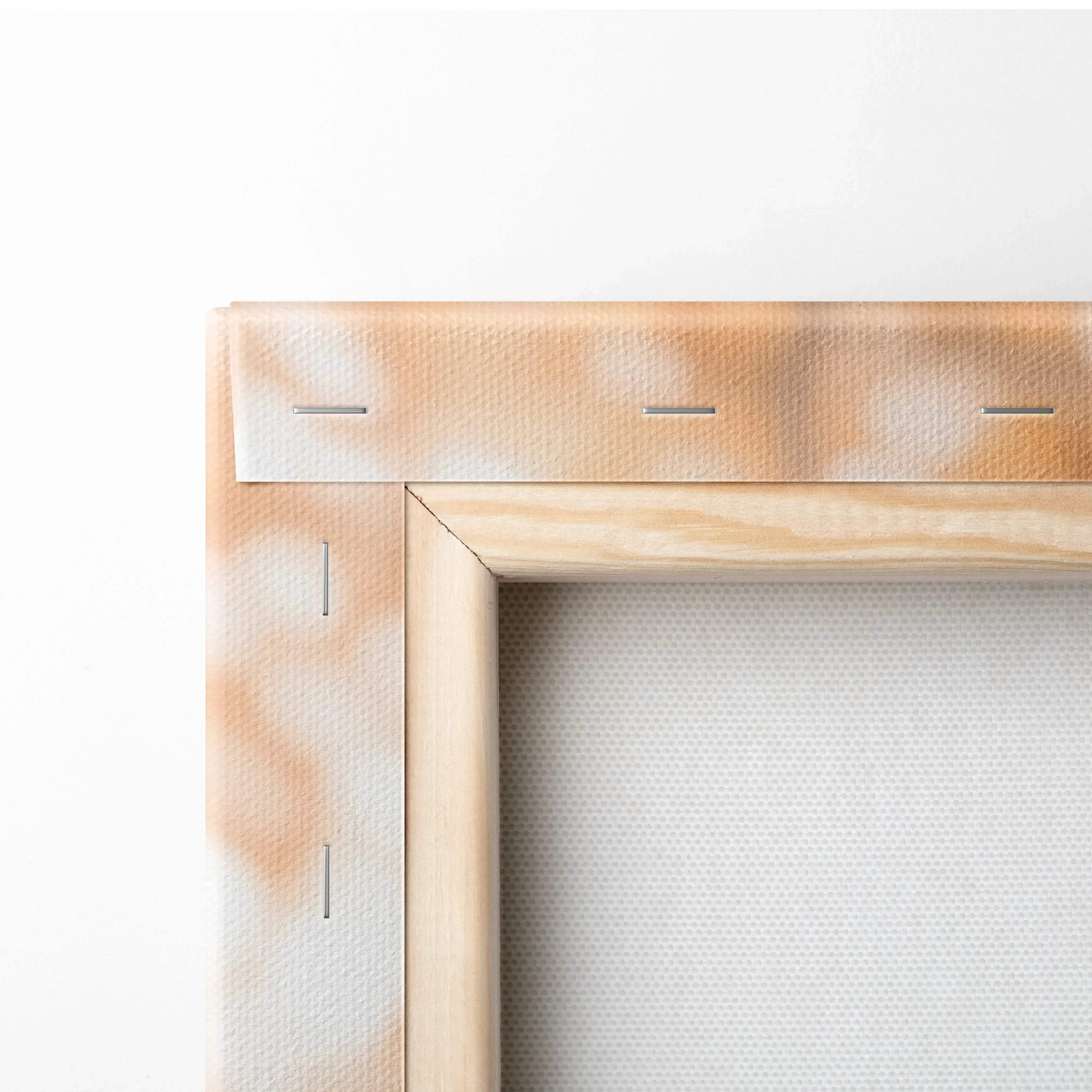 Back side of light-colored wooden canvas frame with textured beige stretcher bar and stitching for bmw m1000rr wall art