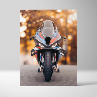BMW M1000RR motorcycle close-up front view canvas art with blurred autumn background wall art.
