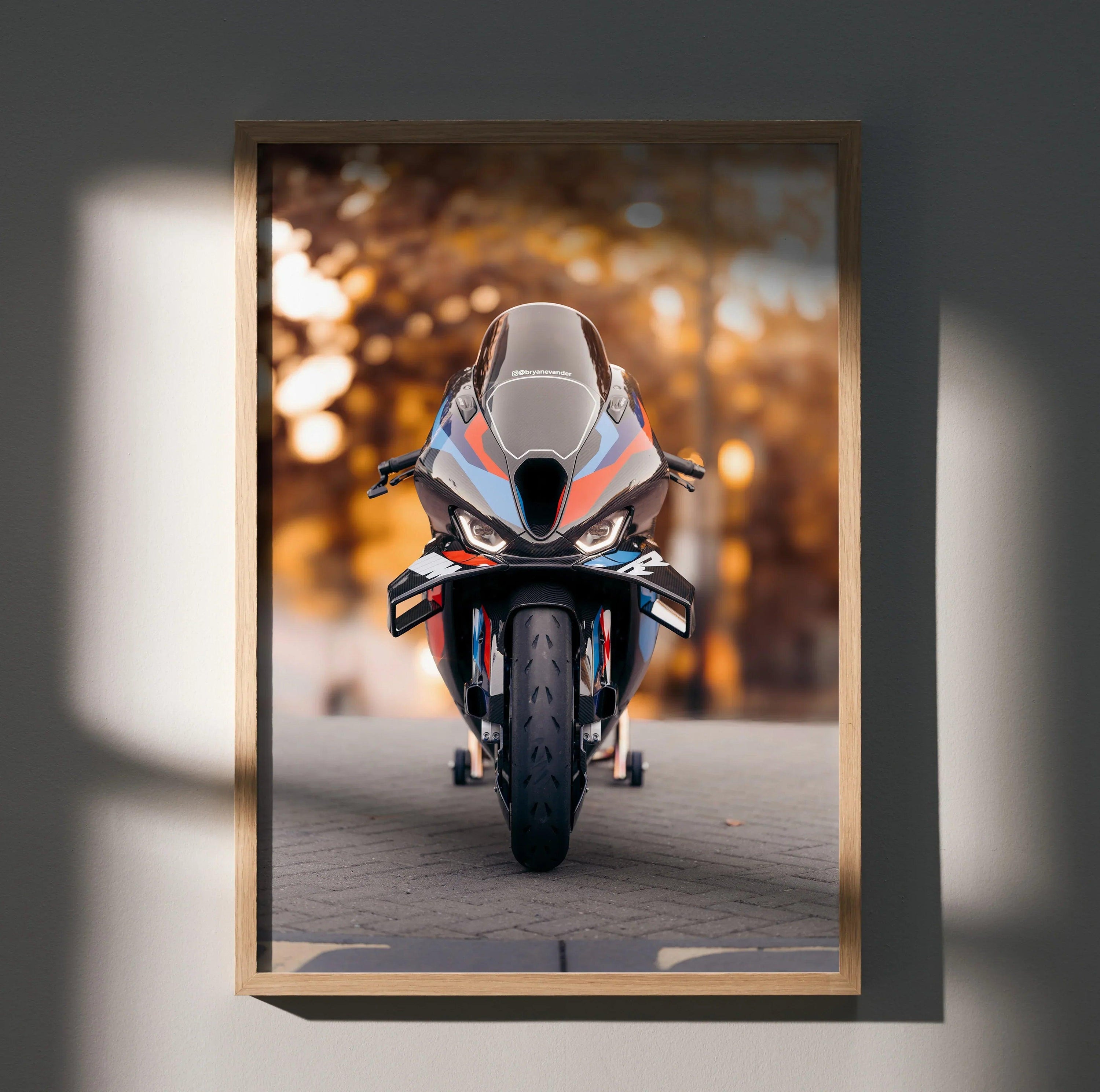 BMW M1000RR motorcycle front view poster with autumn background, premium wall art.