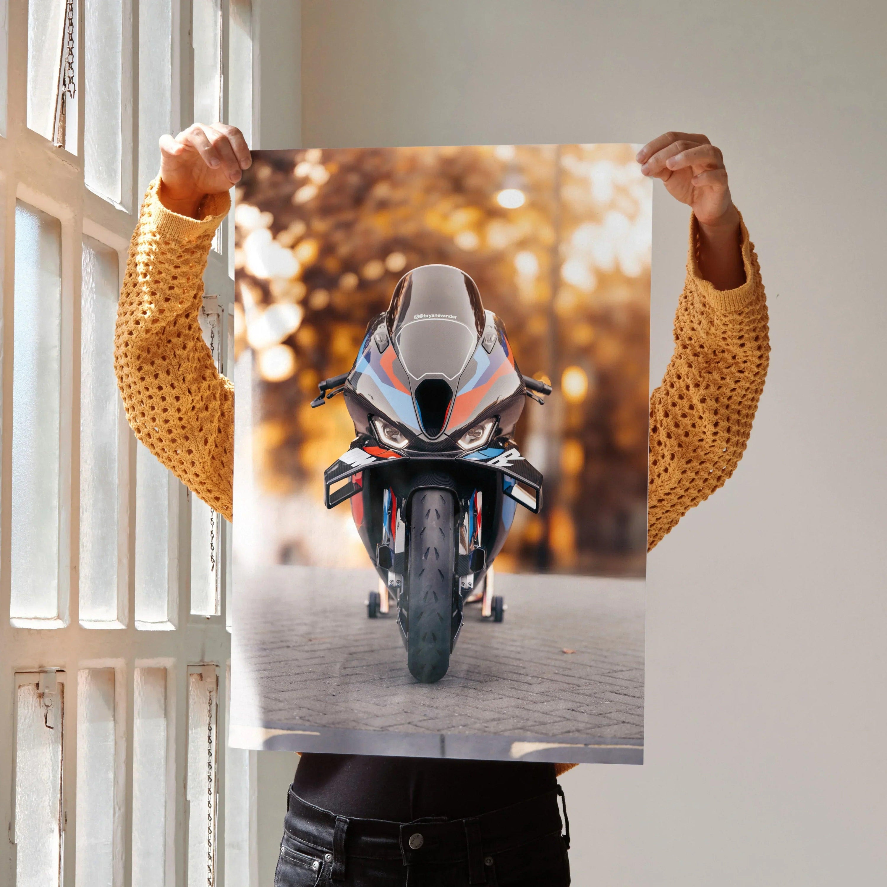 BMW M1000RR motorcycle poster with dynamic front view, vibrant wall art in autumn tones.