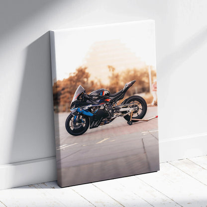 BMW M1000RR motorcycle canvas wall art with sunset glow, vertical museum-quality print.