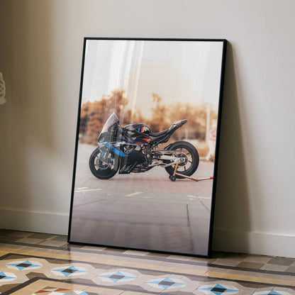BMW M1000RR motorcycle poster leaning against wall with modern floor tiles, wall art decor.