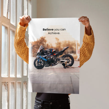 Motivational wall art poster featuring BMW M1000RR motorcycle with "Believe you can Achieve" text.