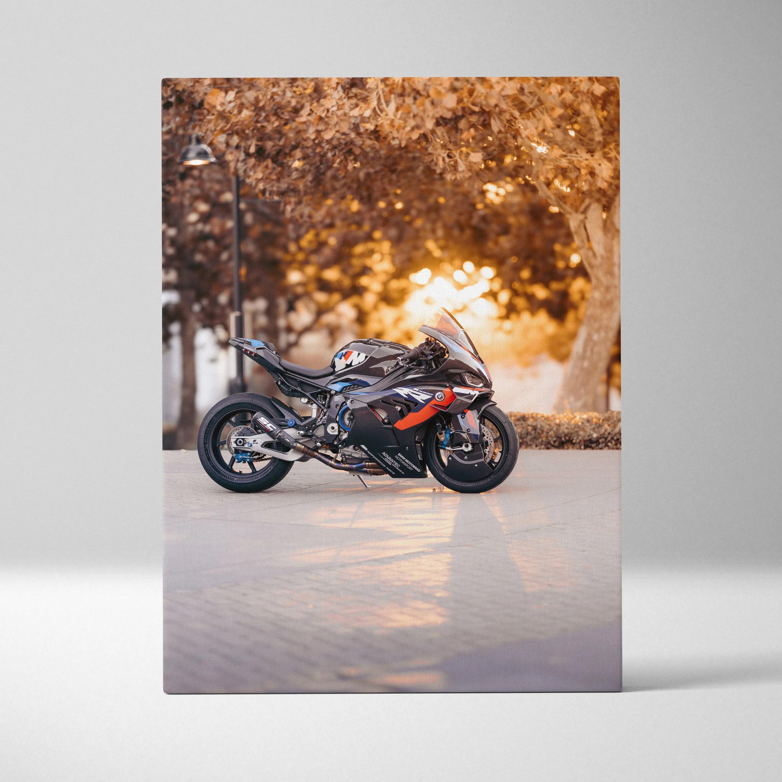 BMW M1000RR motorcycle canvas art with autumn leaves background, vertical wall art print.