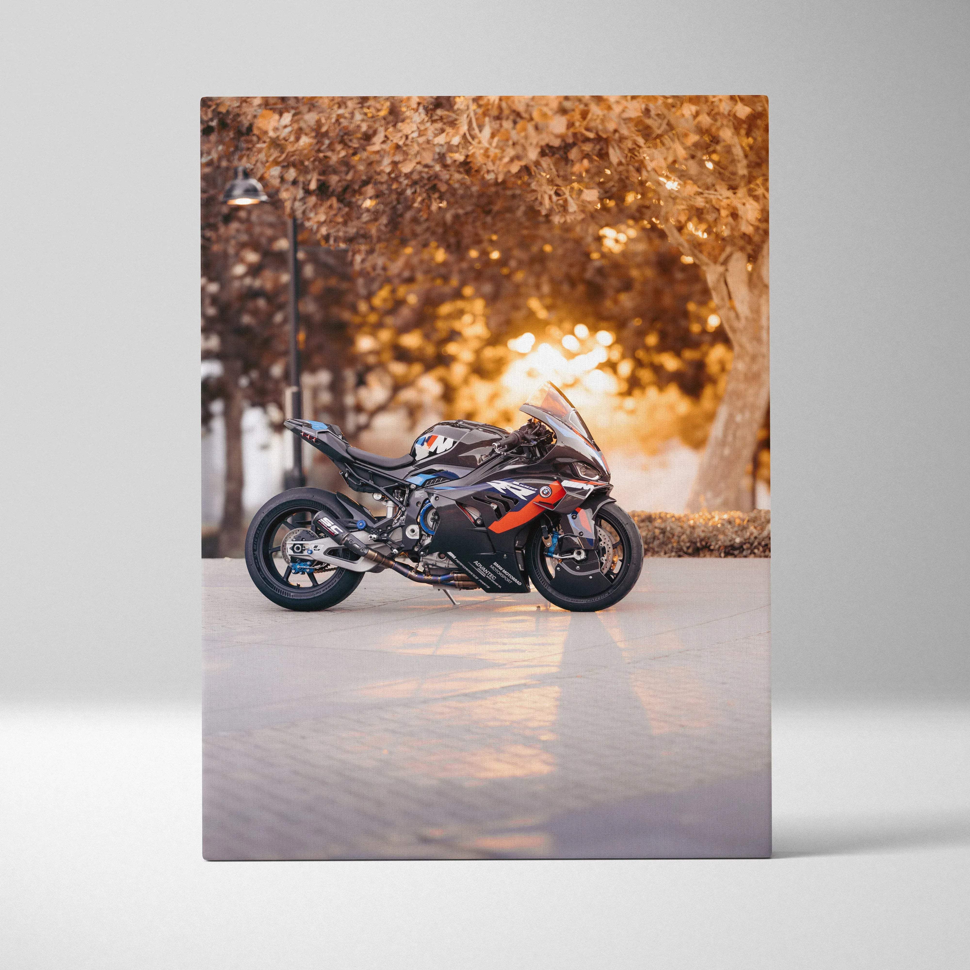 Canvas wall art featuring a black and orange bmw s1000rr sport motorcycle with sleek aerodynamic design inspired by autumn sunset warmth