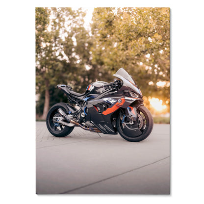 BMW M1000RR motorcycle poster with sleek black and orange design, outdoor setting wall art.