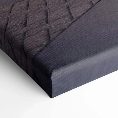 Close-up of black textured canvas art corner with detailed fabric weave for wall art display.