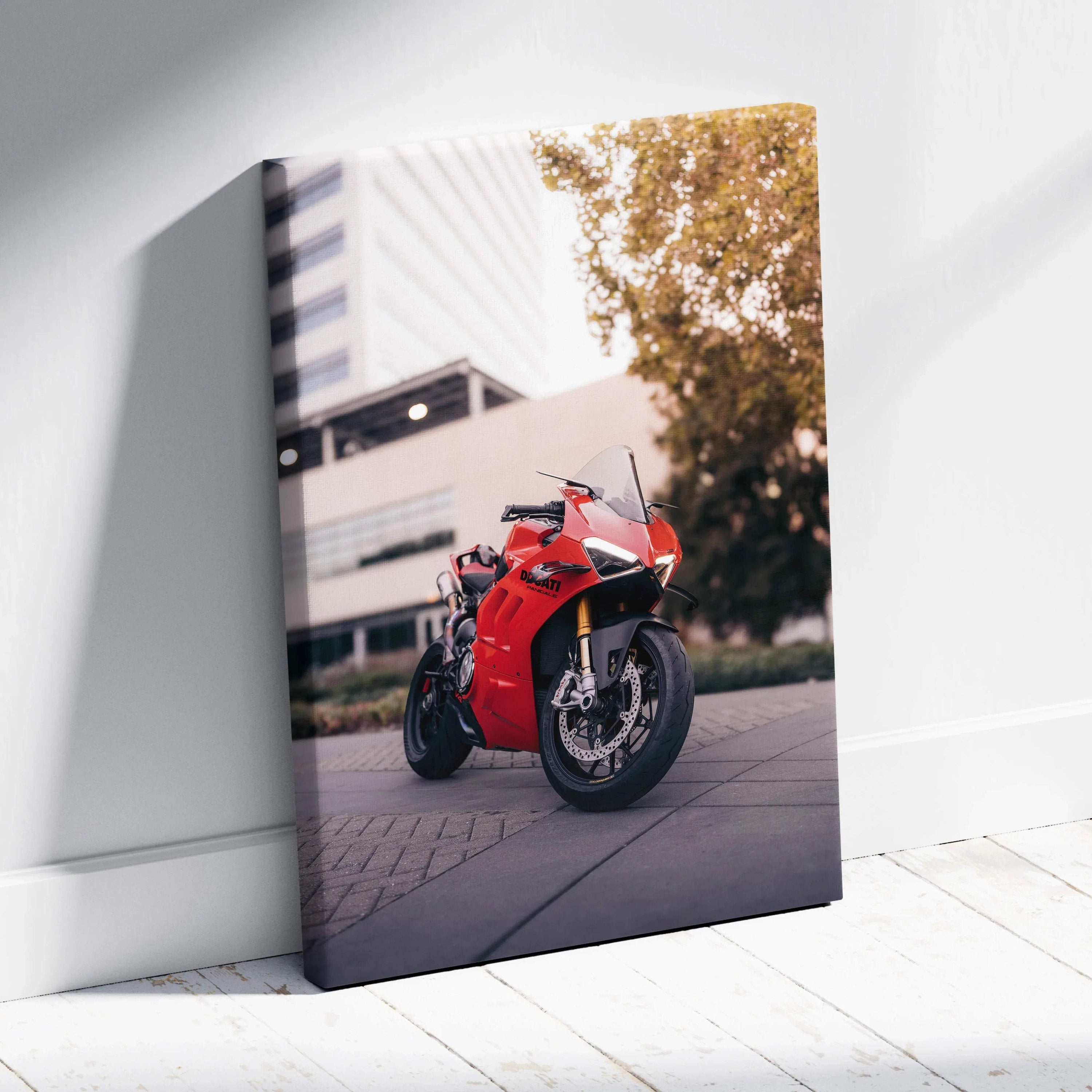 Red Ducati Panigale V4S motorcycle canvas art with modern building and tree background wall art.
