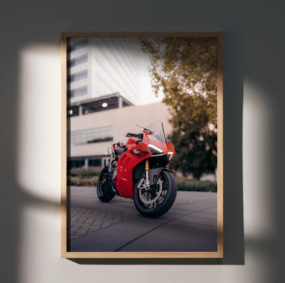 Ducati Panigale V4S motorcycle poster in sleek wooden frame, vibrant red bike against urban backdrop wall art.